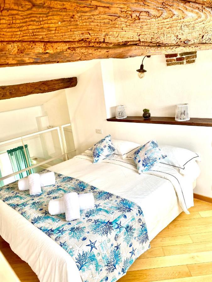 Cozy Loft Marina View Apartment Savona Bagian luar foto